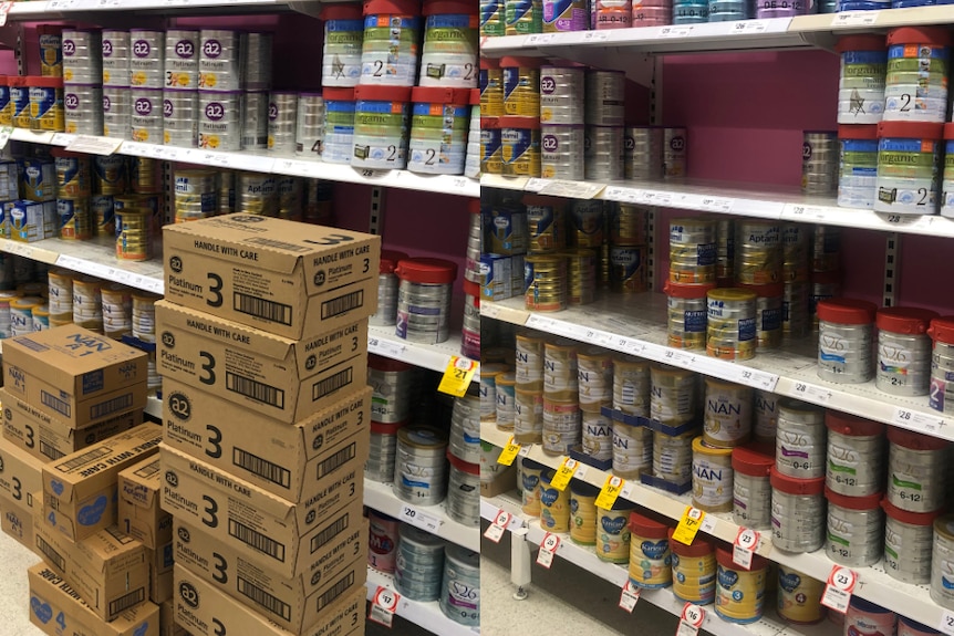 Baby formula on a supermarket shelf with cardboard boxes in the aisle