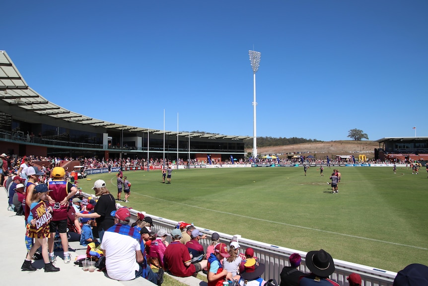 Crowds gather at a Brisbane Lions training session