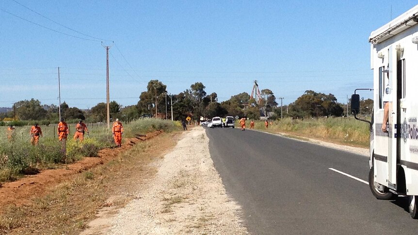 A search is made of the area where the decomposing body was found