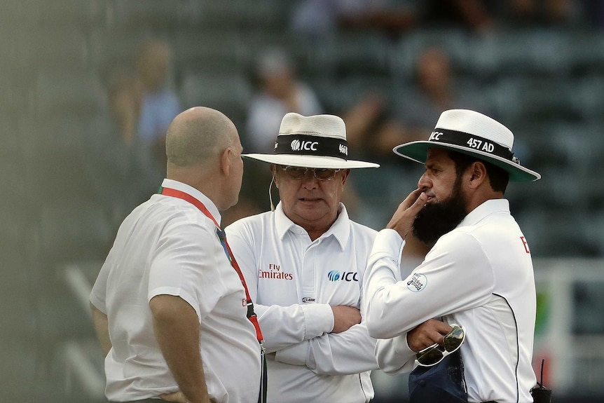 Umpires and match referee confer in South Africa