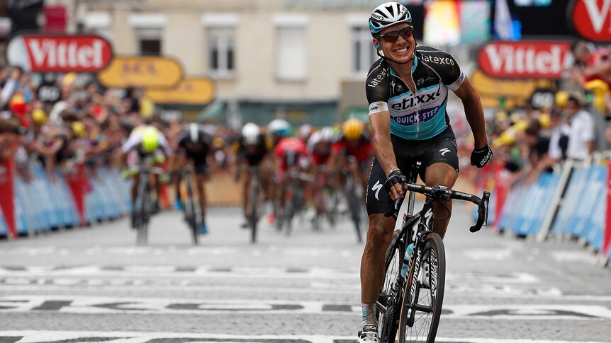 Tony Martin, riding for Etixx-Quick Step, celebrates as he wins stage four of the Tour de France.