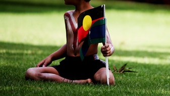 File photo: Indigenous child on Australia Day (Getty Image: Ian Waldie)