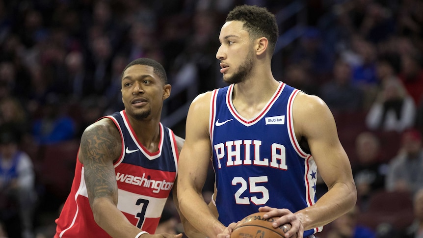 Philadelphia 76ers guard Ben Simmons is intentionally fouled by Washington Wizards guard Bradley Beal.