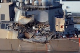Damage to the side of the USS Fitzgerald.