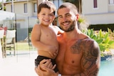 Leroy Faure, 34, with his son Harry, 6, at Noosa on the Sunshine Coast in Queensland.