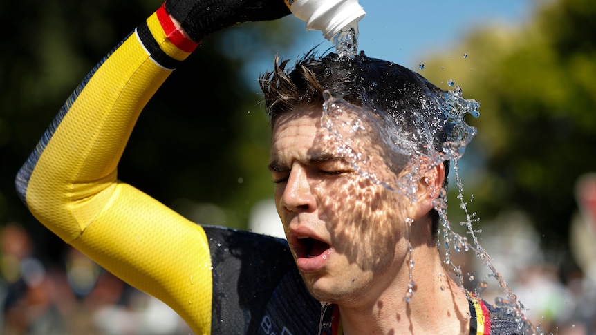 Belgium's Wout Van Aert cools off after the twentieth stage of the Tour de France