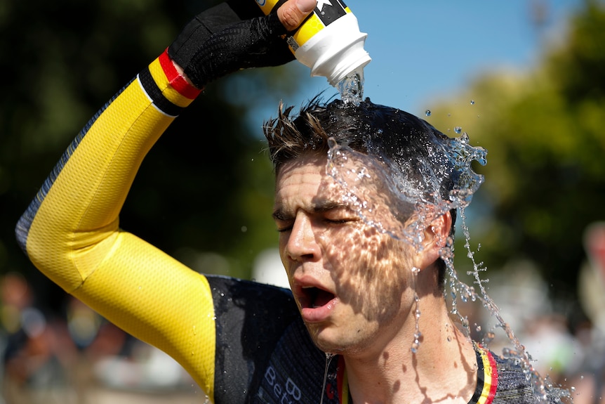 Belgium's Wout Van Aert cools off after the twentieth stage of the Tour de France