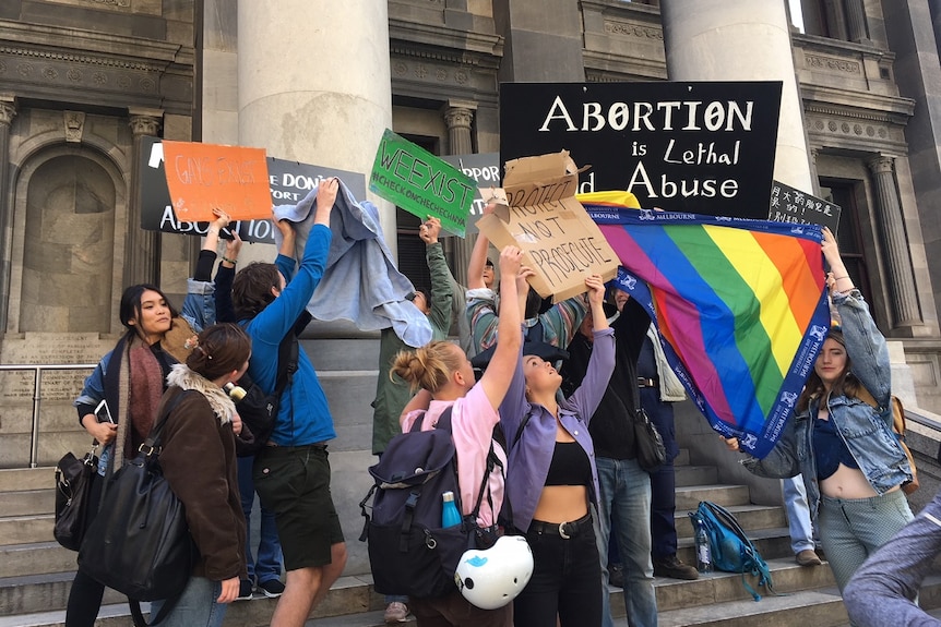 Anti-abortion protesters clash with LGBT supporters.