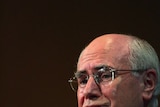 PM John Howard has told his party they deserves to stay in power because they offer better prospects on interest rates and employment than Labor. (File photo)