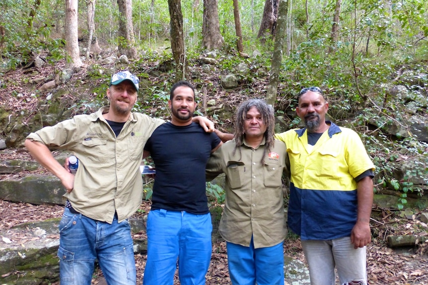 Indigenous rangers standing together outside