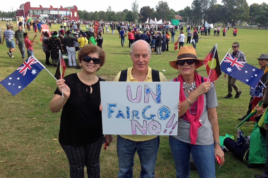 Protesters Isabel Mackay-Sim (R) and her husband Rod (C)