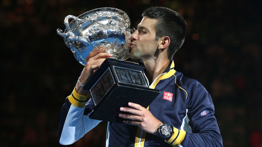 Old friends ... Novak Djokovic holds the Norman Brookes Challenge Cup