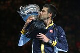 Old friends ... Novak Djokovic holds the Norman Brookes Challenge Cup