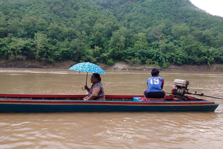Sarween river transport with Karen woman