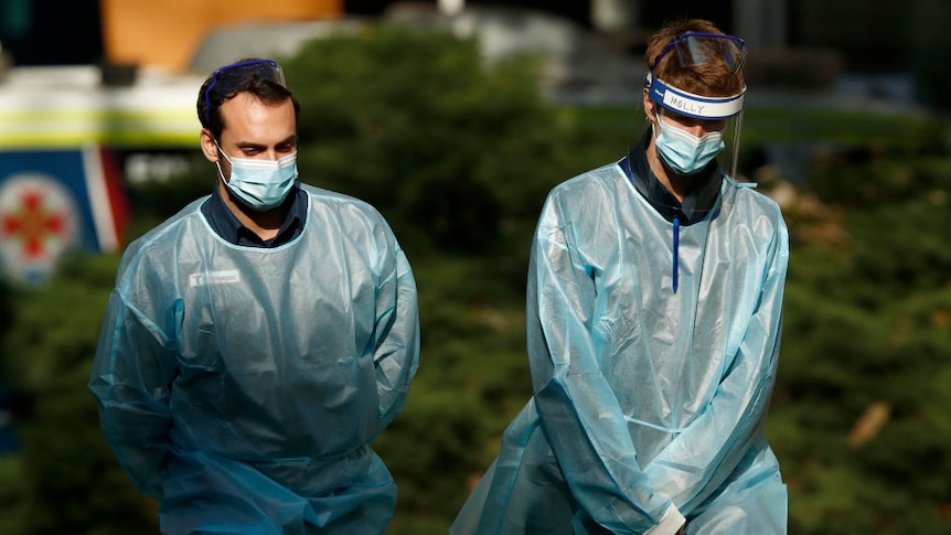 Paramedics are seen at the North Melbourne Public Housing tower complex on July 08, 2020 in Melbourne, Australia.