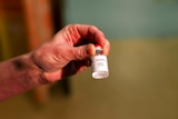 A photo of the Oxford University-AstraZeneca COVID-19 vaccine in a bottle.