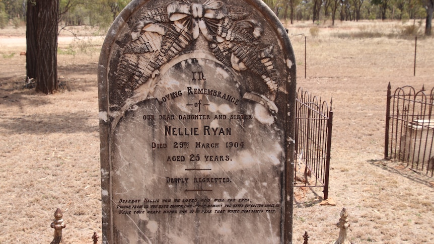 An old gravestone that read reads Nellie Ryan died 29th of March 1904, aged 25 years deeply regretted 