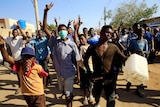 Sudanese demonstrators march during anti-government protests.