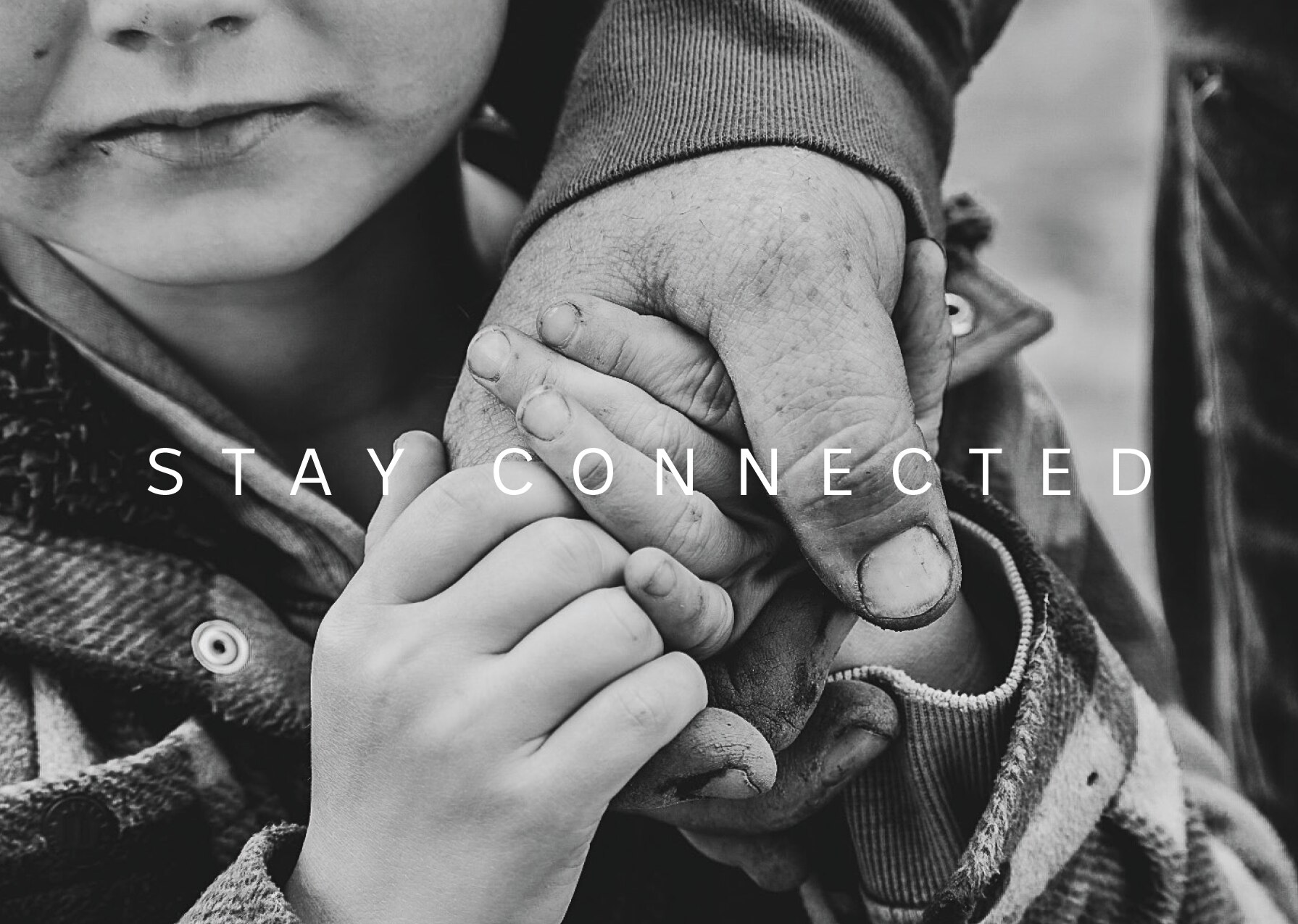 A young child holding an adult's hand, with 'Stay Connected' superimposed over the top.