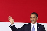 Barack Obama arrives on stage to deliver a speech at the University of Indonesia