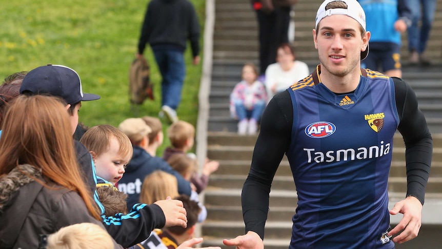 Hawthorn's Ryan Schoenmakers is greeted by fans at Hawks training on September 22, 2015.