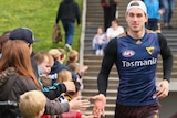 Hawthorn's Ryan Schoenmakers is greeted by fans at Hawks training on September 22, 2015.