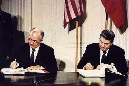 Ronald Reagan signs a treaty with the Soviet Union in 1987.