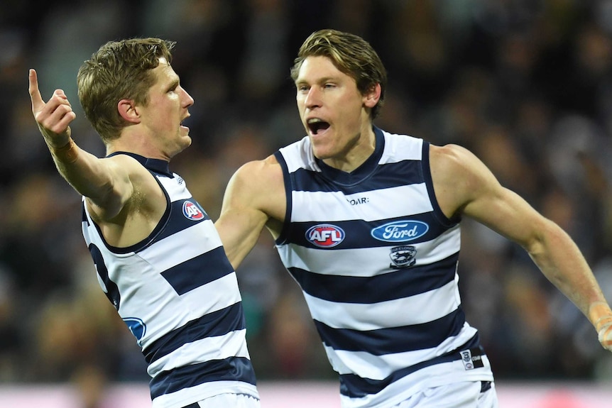 Scott Selwood is joined by Mark Blicavs in celebrating a goal.