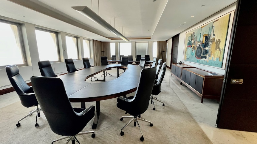 A wide shot of the empty Reserve Bank of Australia boardroom.