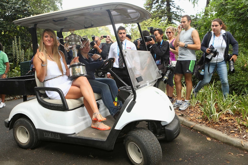 Azarenka shows off the Australian Open trophy