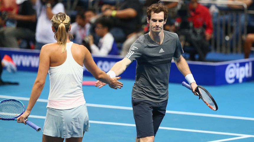 Maria Sharapova and Andy Murray (R) celebrate a point in International Premier Tennis League match.