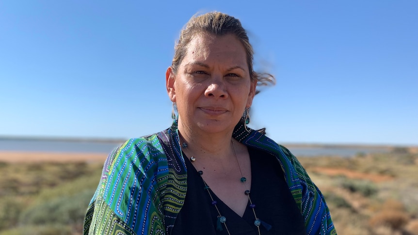 A woman in a bush environment.