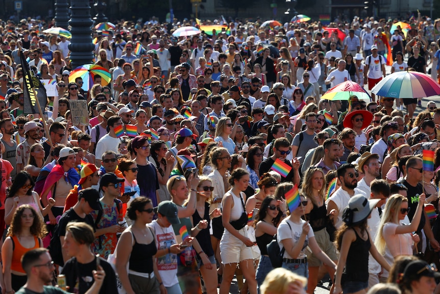 People attend the annual Pride march in Budapest.