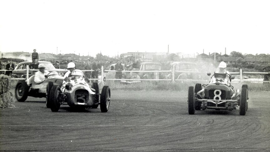 Jack Brabham (far R) racing in 1954.