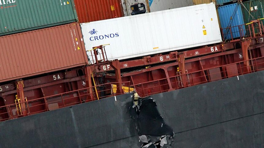 A large crack in the side of the grounded container ship Rena in New Zealand's Bay of Plenty near Tauranga.