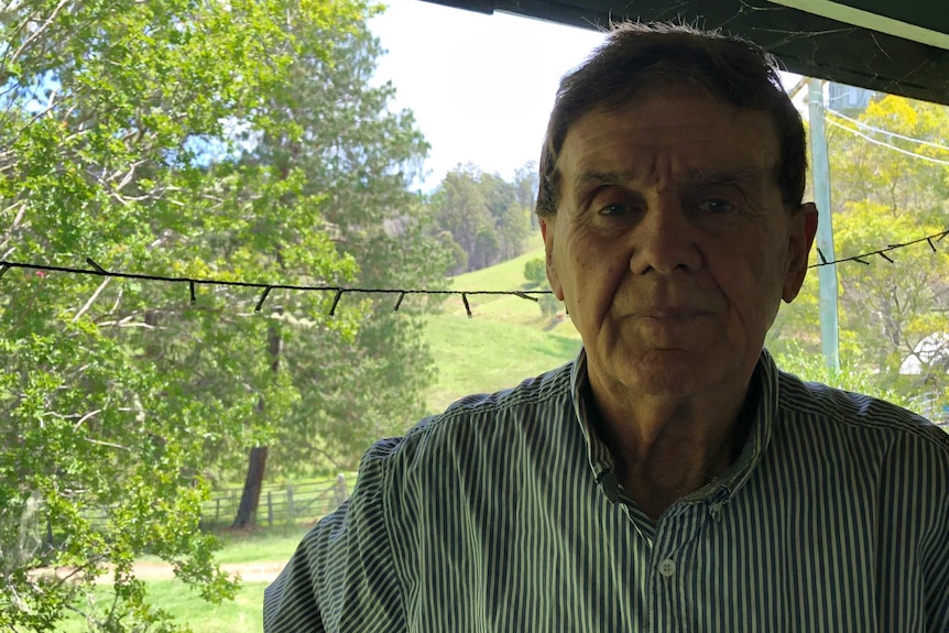 A man on a front porch.