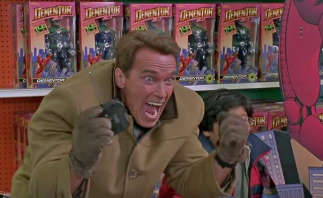 Arnold Schwarzenegger excited in toy aisle movie scene in Jingle All The Way