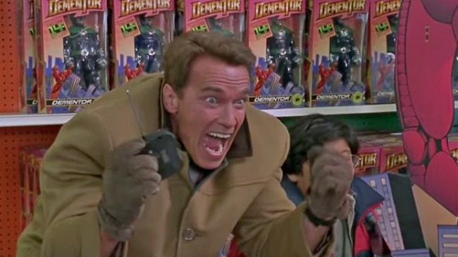 Arnold Schwarzenegger excited in toy aisle movie scene in Jingle All The Way