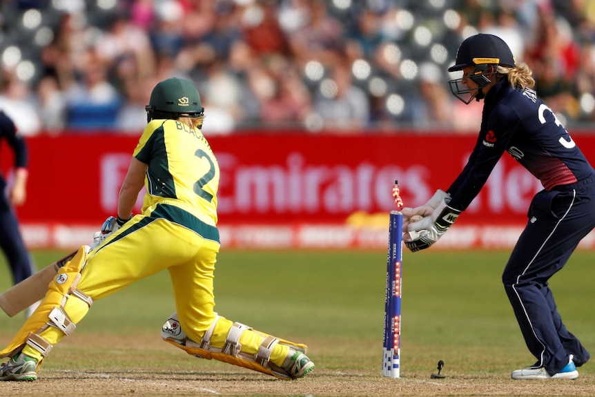 Australia's Alex Blackwell is bowled by England's Katherine Brunt at the Women's World Cup.