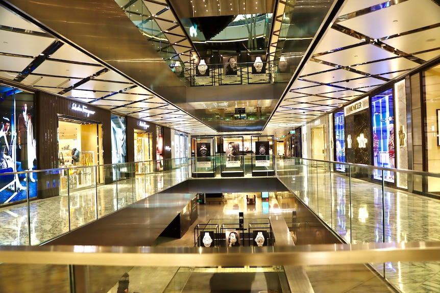 Empty shopping centre and closed shops during Sydney's COVID lockdown.