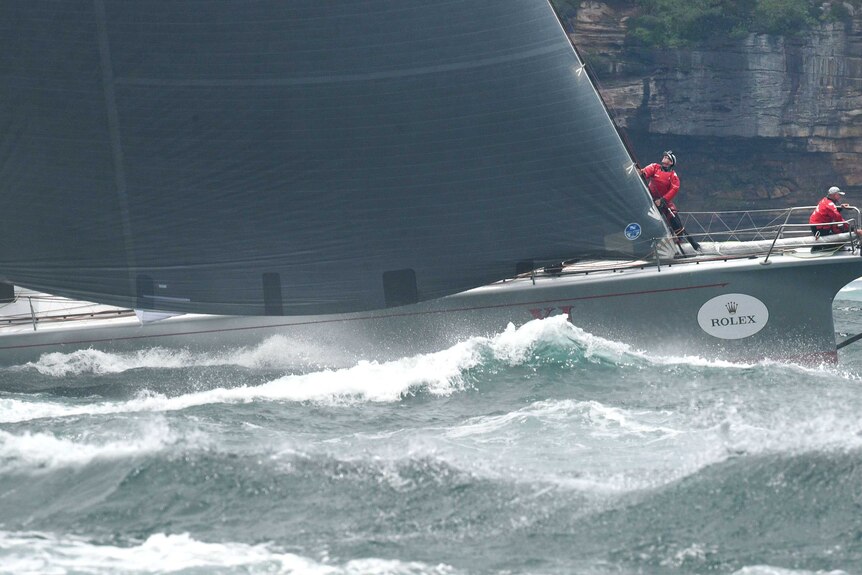Wild Oats XI powers through waves at the start of the 2015 Sydney to Hobart.