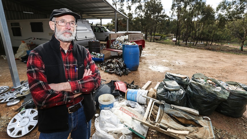 Bill Wiglesworth at home in Walmer surrounded by rubbish collected from 2.2 km of road.