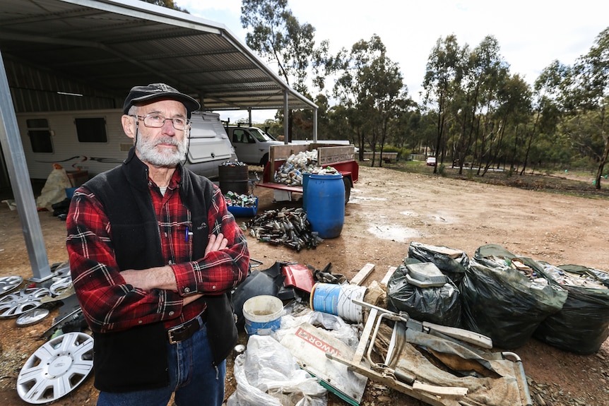 Bill Wiglesworth at home in Walmer surrounded by rubbish collected from 2.2 km of road.