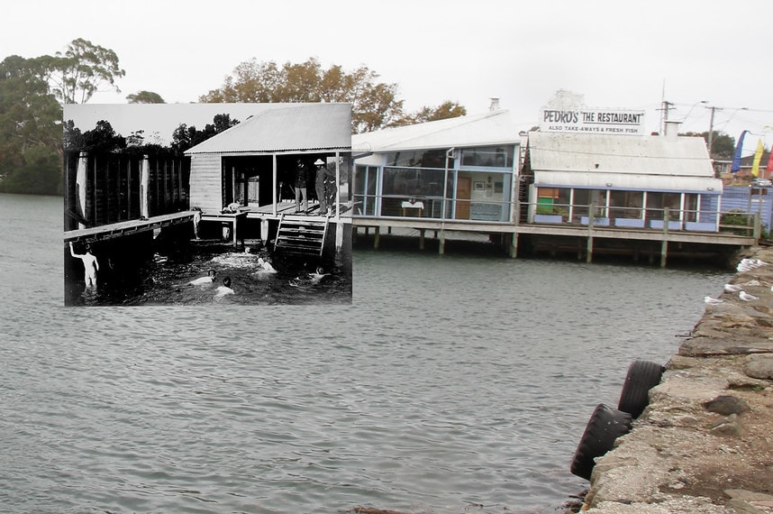 An old photo of the Leven River baths at Ulverstone is held up. Background consists of restaurant on the river's edge.