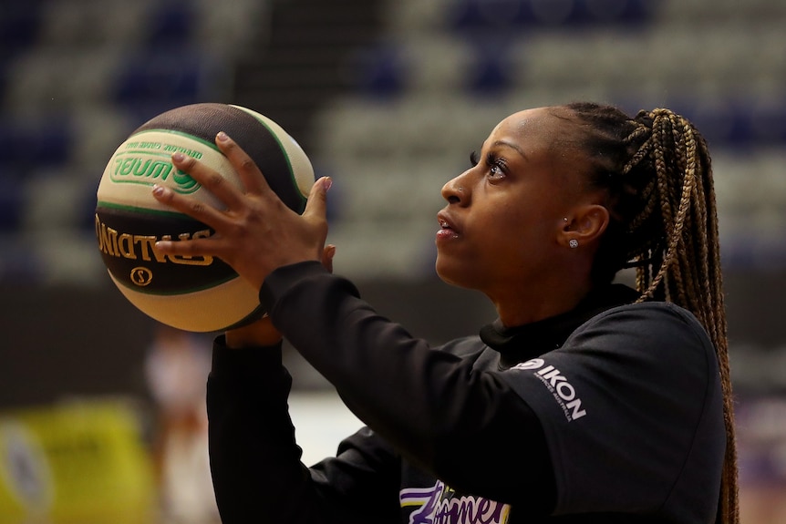 Tiffany Mitchell of the Boomers practising shooting