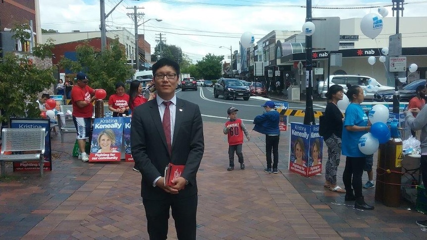 Sean Kim, from the Korean Society of Sydney, stands in Eastwood Mall in the northern Sydney seat of Bennelong.