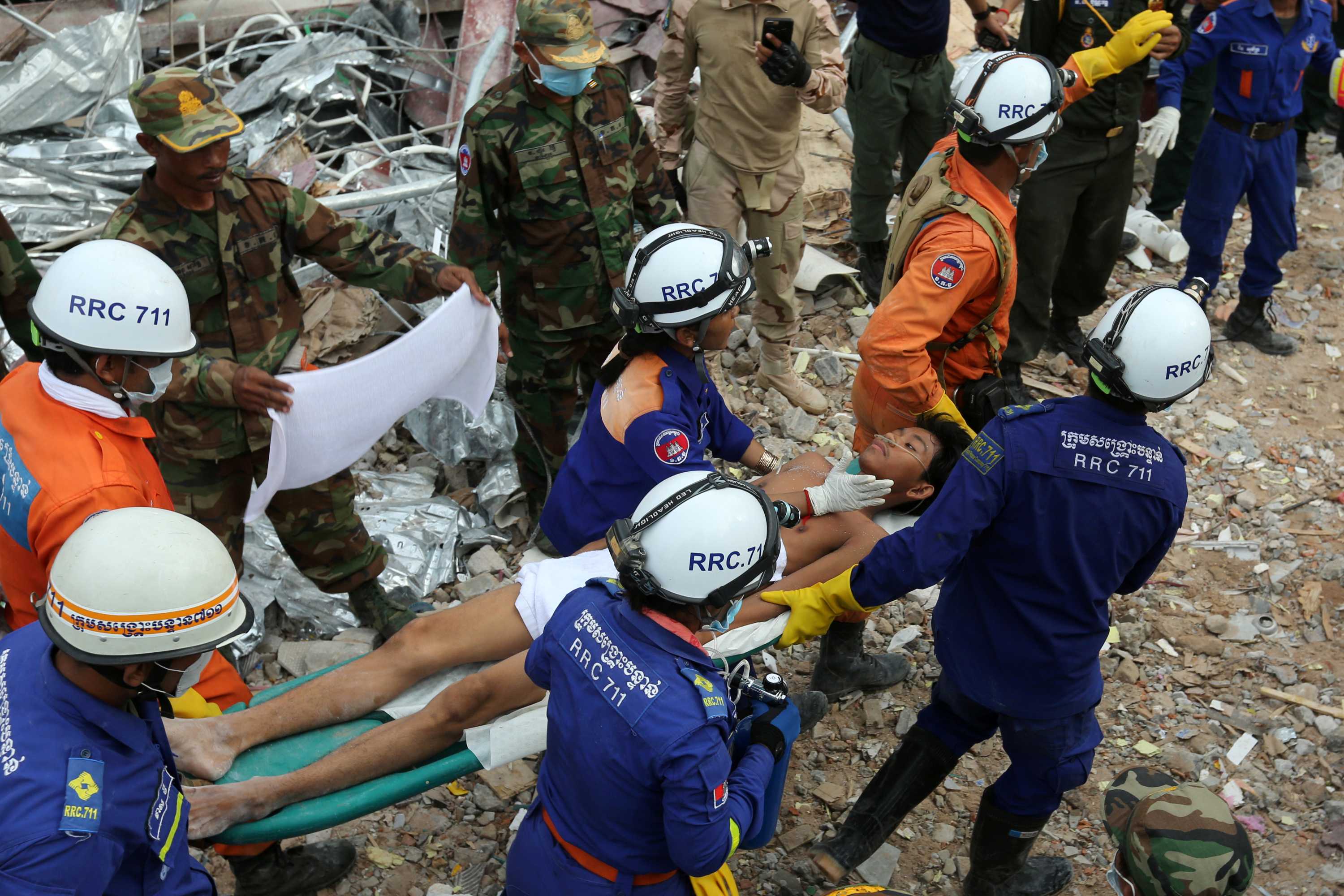 Cambodia Building Collapse Survivors Found As Manslaughter Charges Laid ...