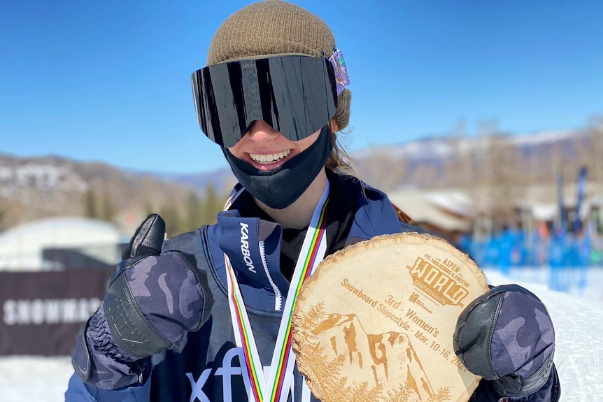 Tess Coady poses for a photograph with her medal after winning bronze at the FIS World Championships in Aspen.