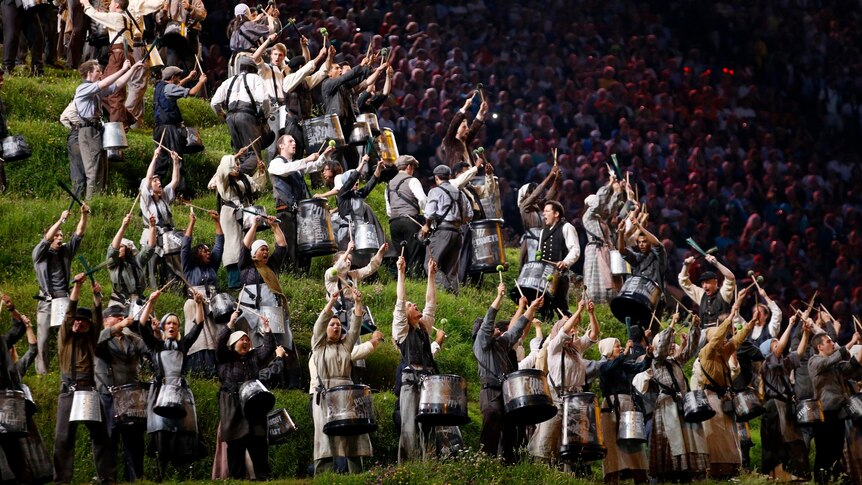 Performers take part in the opening ceremony of the London 2012 Olympic Games.