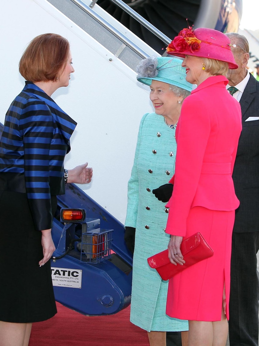 Julia Gillard greets The Queen in Canberra as Quentin Bryce looks on